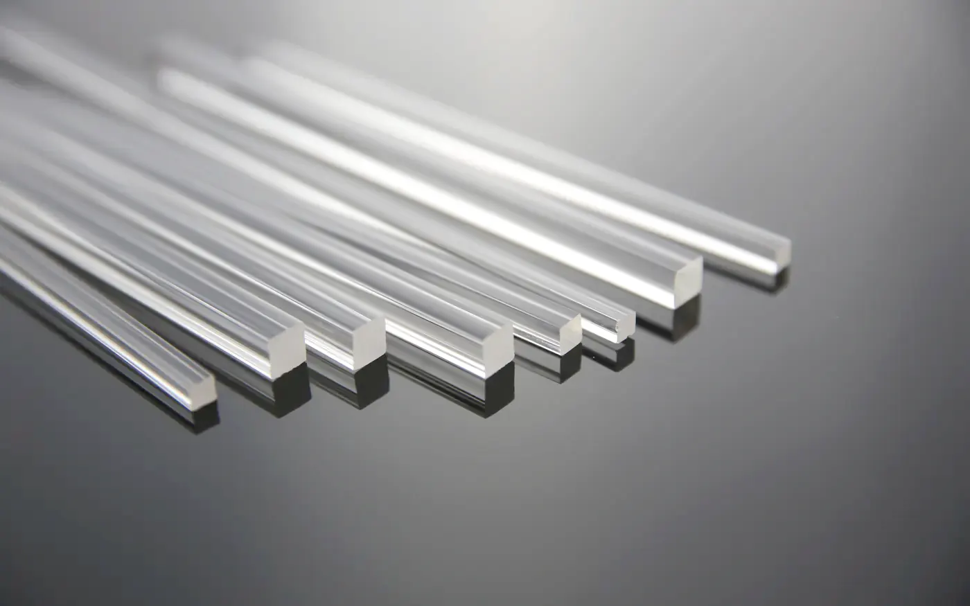 Clear solid acrylic square bar in a range of section sizes, fanned out