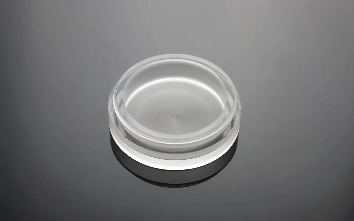 Clear acrylic disc used as a rotating display base