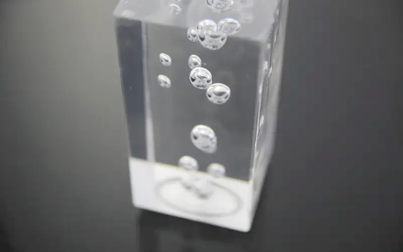 Clear acrylic section with cast bubbles inside