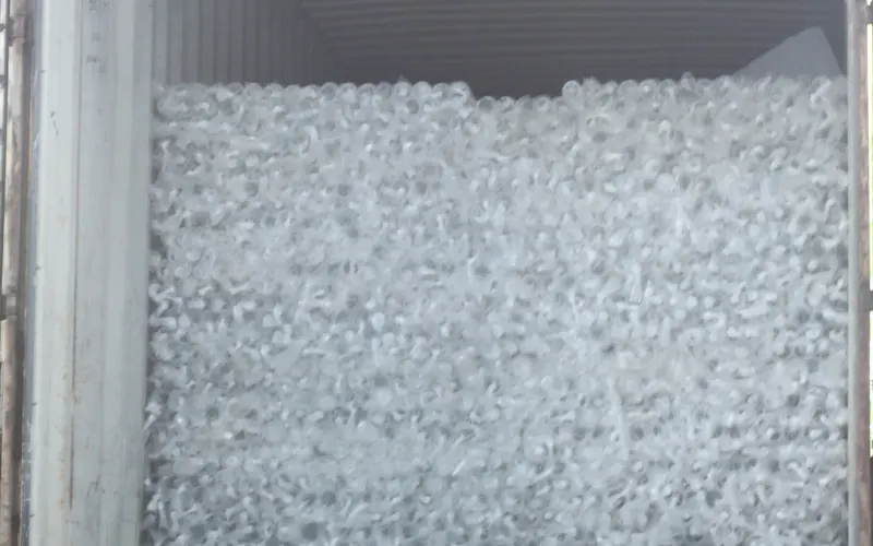 A 40-foot container fully loaded with wrapped extruded tube