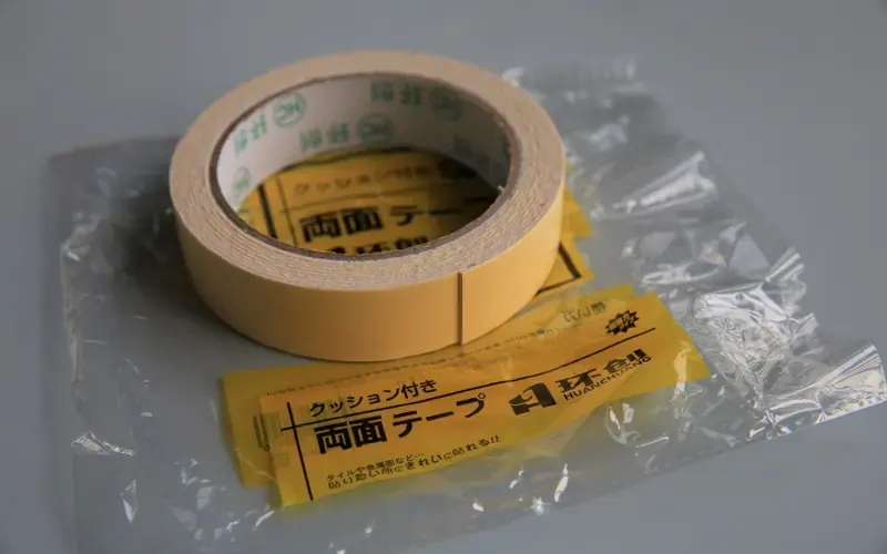 Double-sided adhesive tape supplied with wall corner guards