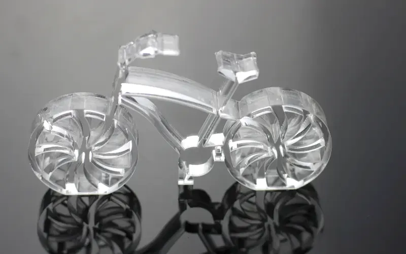 Decorative clear acrylic parts assembled into an ornament