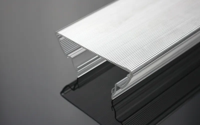 Fluted cover profile fitted to a base section