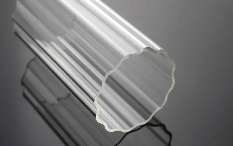 Clear acrylic profile with a fluted outer surface