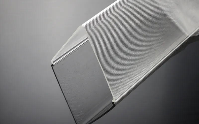 Extruded angled profile used as a sign and label holder