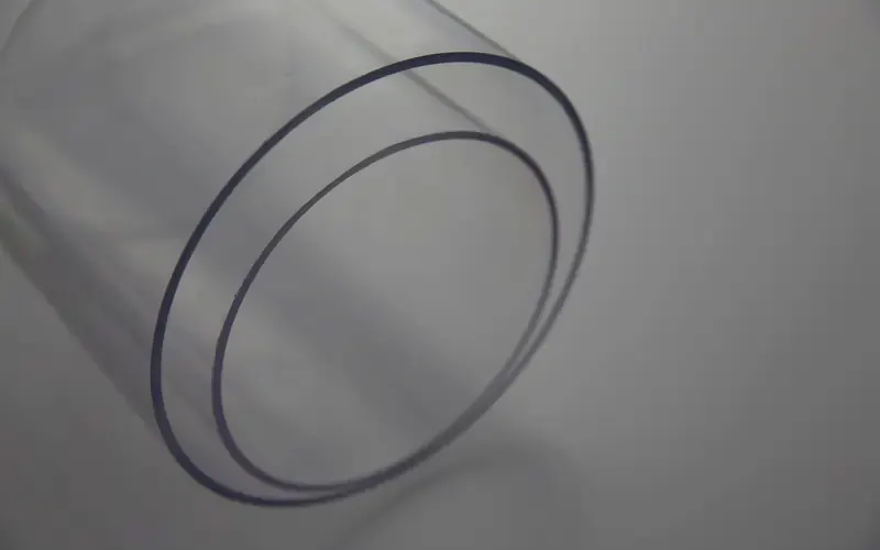 Cut end of an extruded tube showing the wall thickness